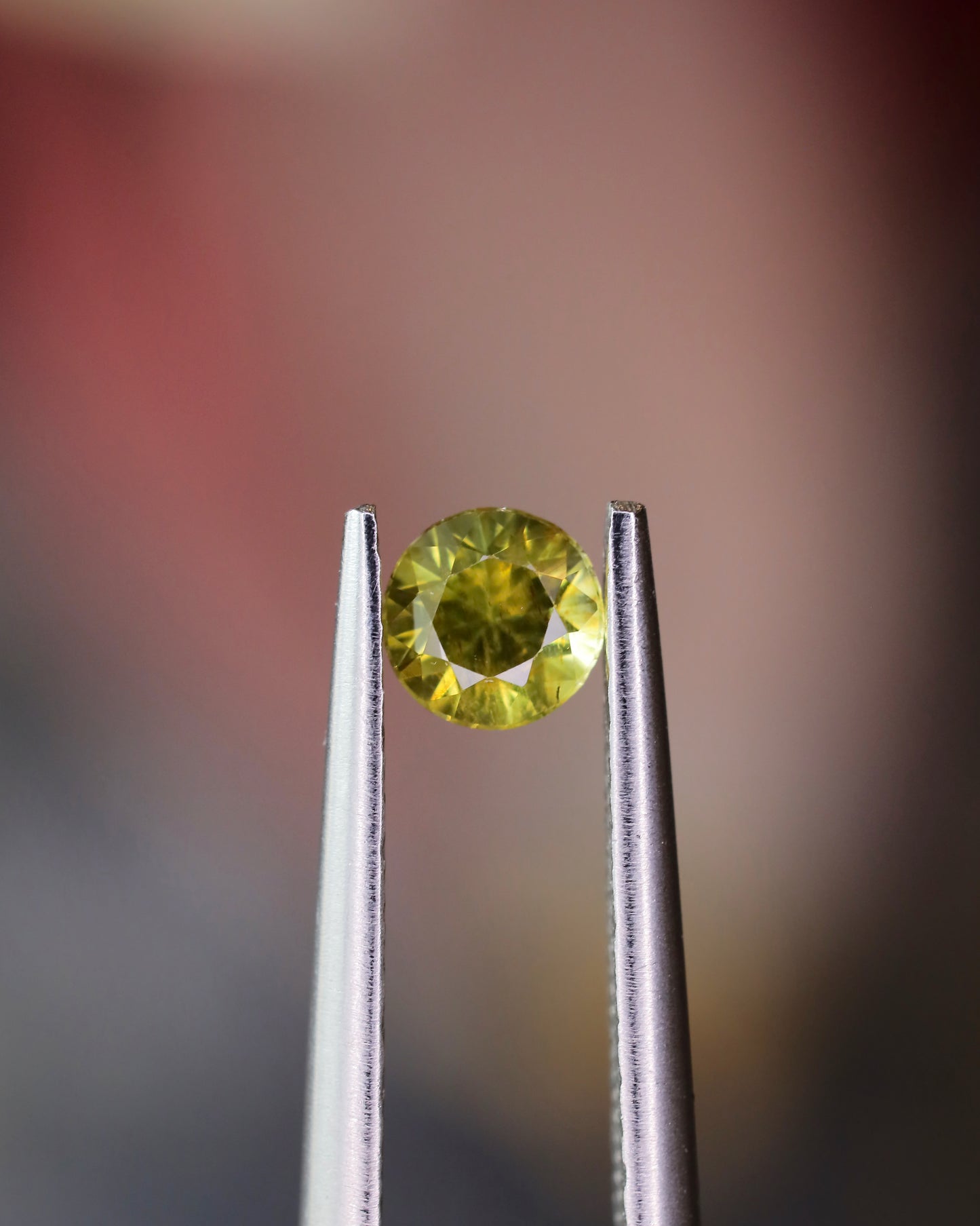 パラサイトペリドット ルース 0.25ct 鑑別書付き